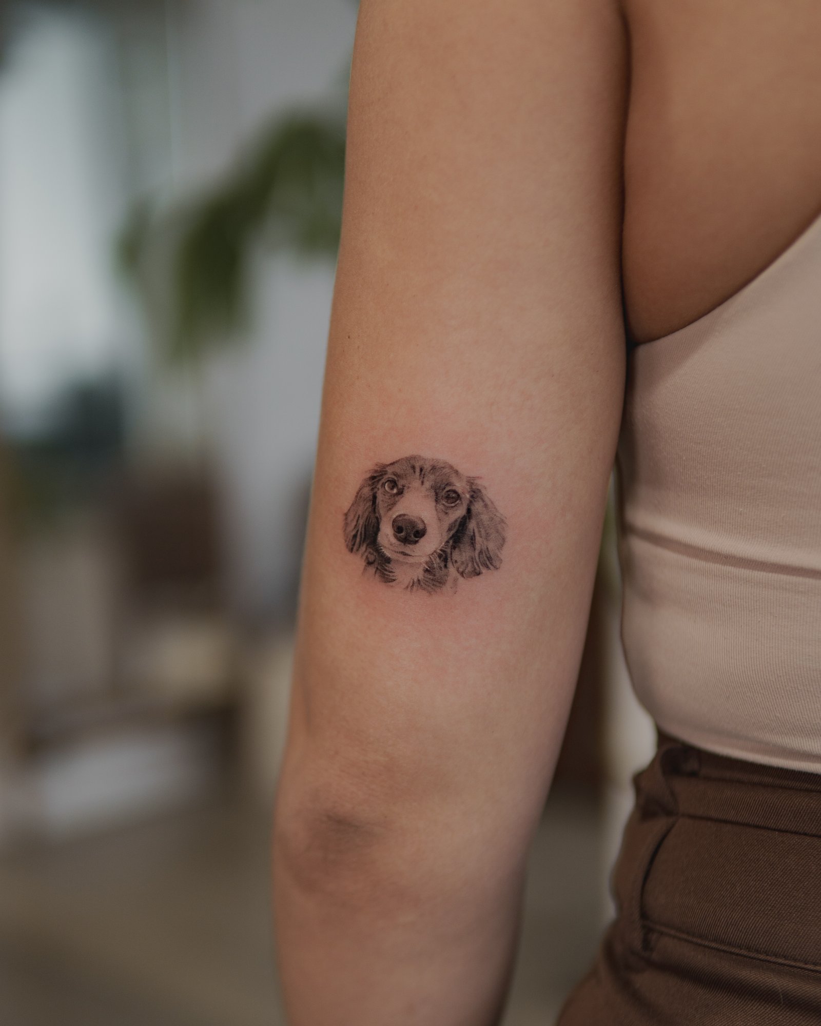 Golden retriever portrait tattoo with fur texture detail