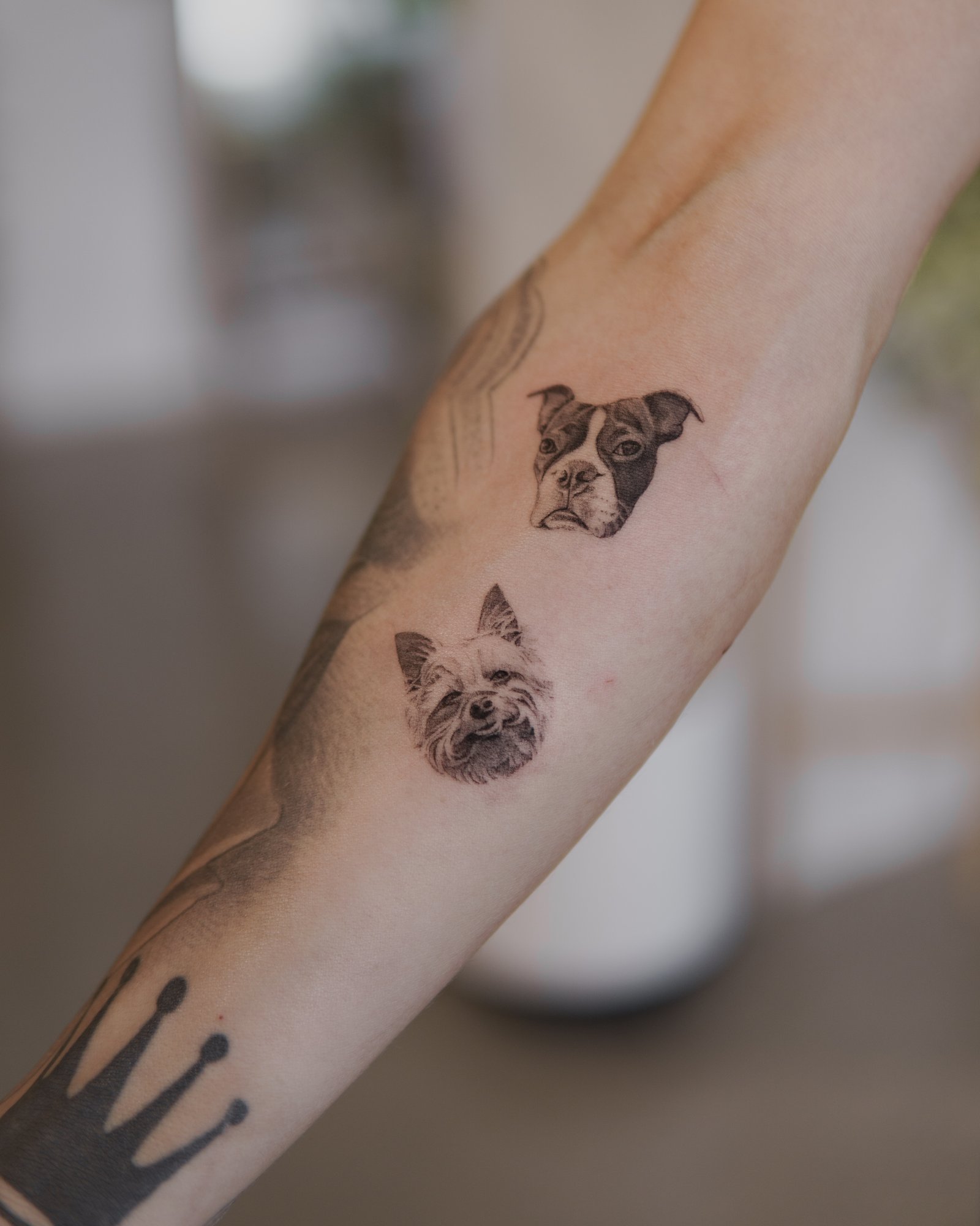 Pet portrait tattoo showing eyes and facial features in detail